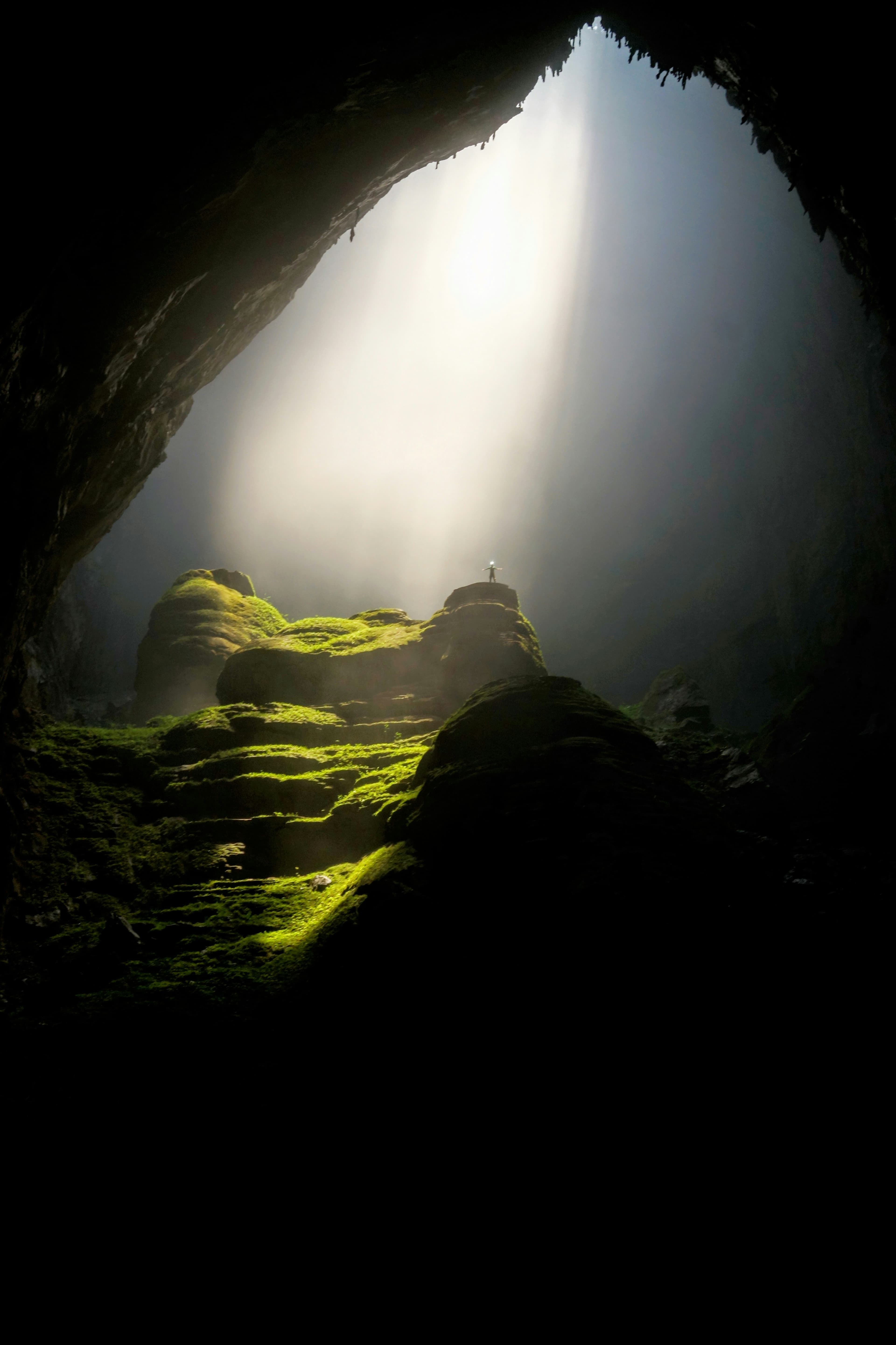 Explorer inside Hollow Ridge Caverns